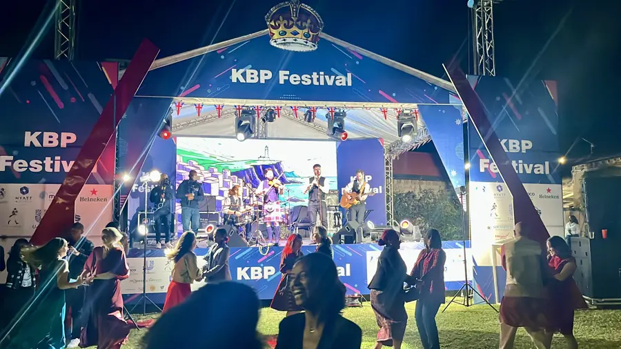 The band on a festival stage at night